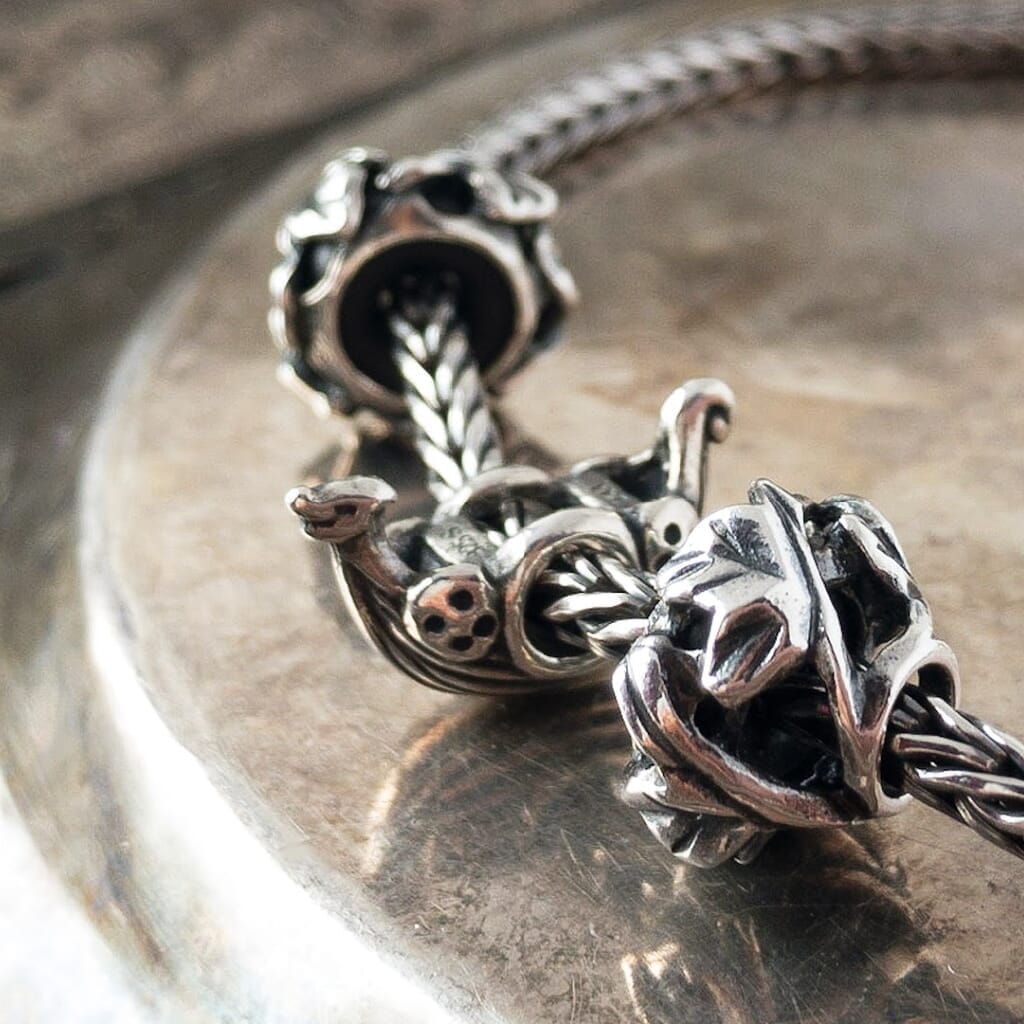 Trollbeads sterling silver bead of an ancient viking ship, shown on a sterling silver Trollbeads bracelet.