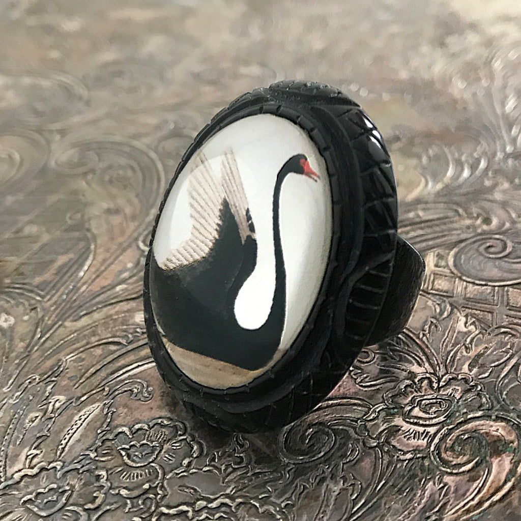 Suzie Q Studio carries HOTCAKES DESIGN retro-style, handmade jewelry taking its inspiration from classic Bakelite jewelry, vintage images and bold color. The graceful Black Swan image featured in this ring, is a gentle reminder to reclaim your personal power and wear it boldly!