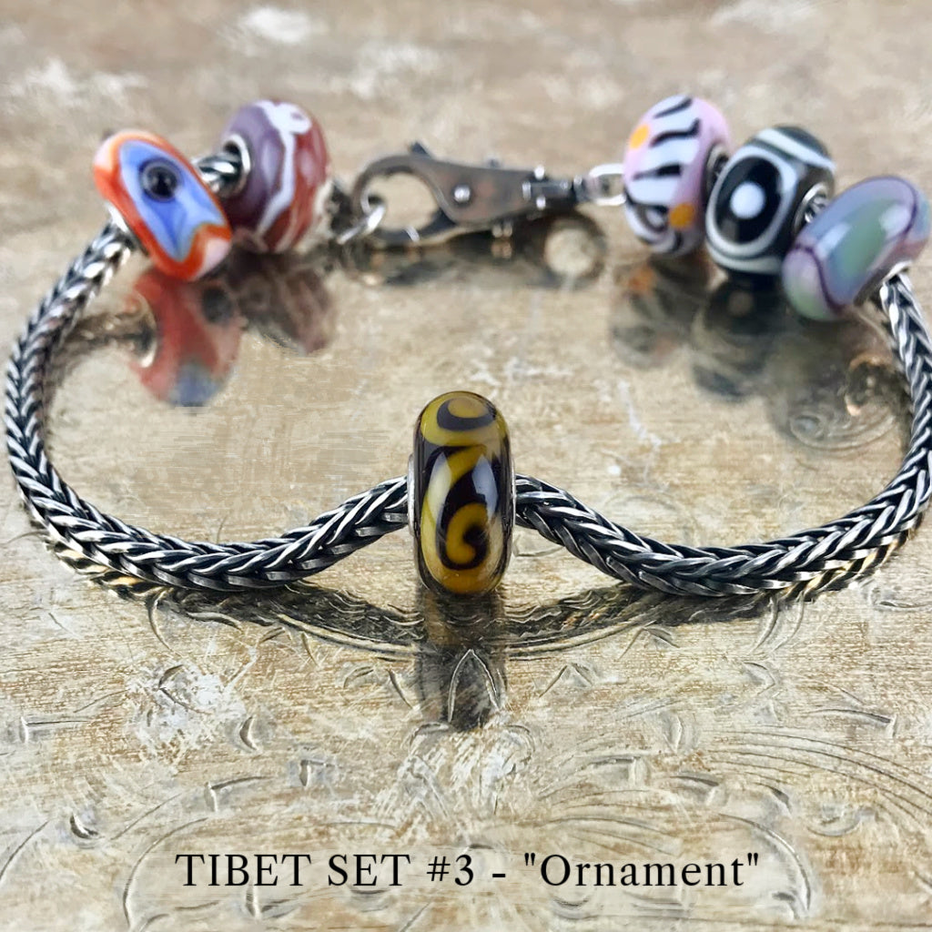Now available at Suzie Q Studio, the ultra-rare Trollbeads Tibet Beads. This is the ORNAMENT bead in the Trollbeads Tibet Set #3.