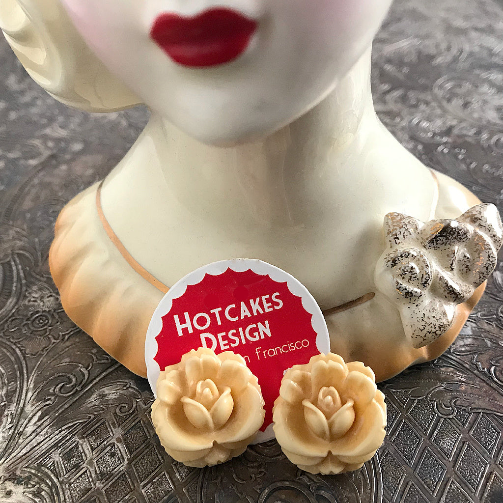 Suzie Q Studio carries HOTCAKES DESIGN retro-style, handmade jewelry taking its inspiration from classic Bakelite jewelry, vintage images and bold color. This pair of antique-style, carved-rose earrings is the perfect (and sweet) accent for almost any outfit, day or evening!