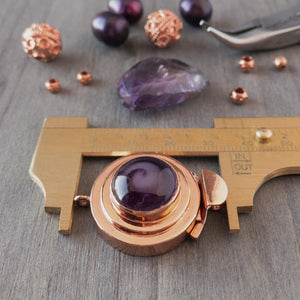 The amethyst-coloured, vintage glass cabochon in this unique box clasp has a delightful swirl of pale purple, and it was individually handcrafted in 100% pure copper, exclusively for Suzie Q Studio.