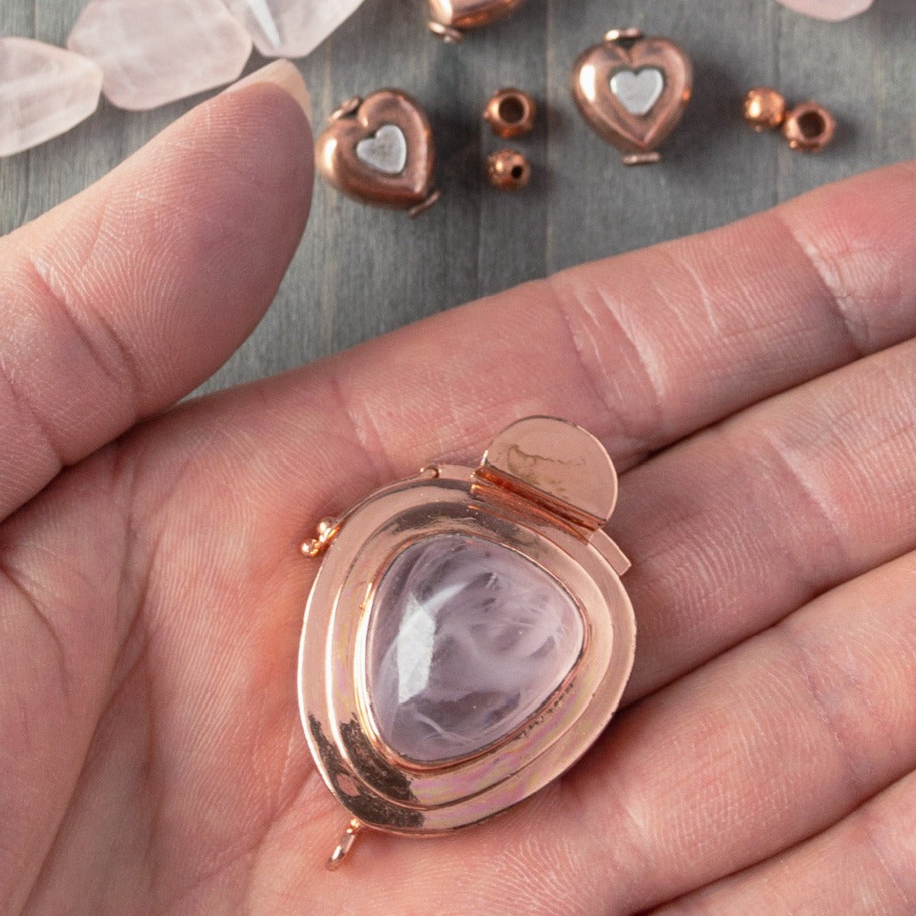 Showcasing a triangle-shaped vintage glass cabochon, in a lovely tone of "hint-of-pink" colour, this custom box clasp was individually handcrafted in 100% pure copper, exclusively for Suzie Q Studio.