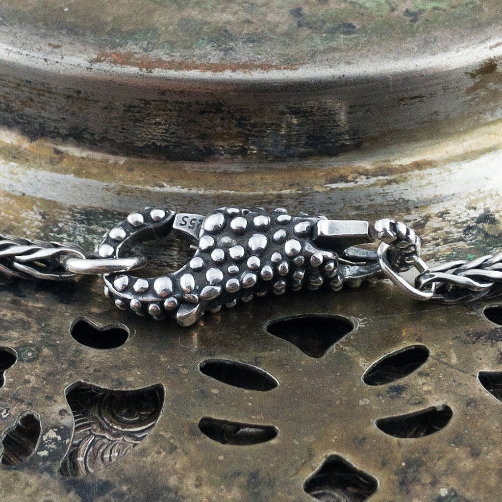 ​This item left the collection in 2019​.​  This beautiful lock/clasp was introduced with the Christmas 2012 collection, yet it is an everyday clasp and not holiday specific. The tiny buds that adorn this sterling silver clasp are a reminder of Spring and new growth.
