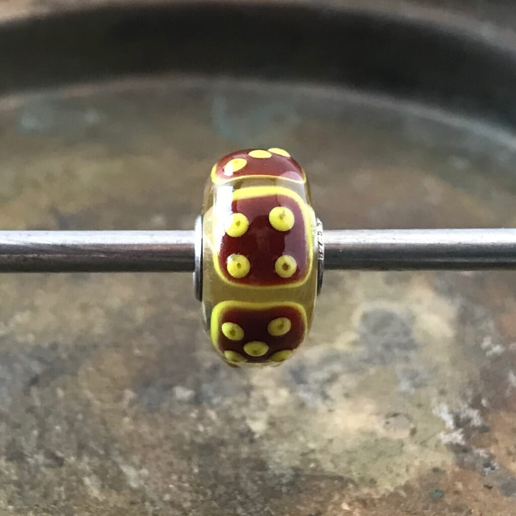 The rare and retired Trollbeads collection at Suzie Q Studio includes this one-of-a-kind Trollbeads Uniques glass "Dice" bead.