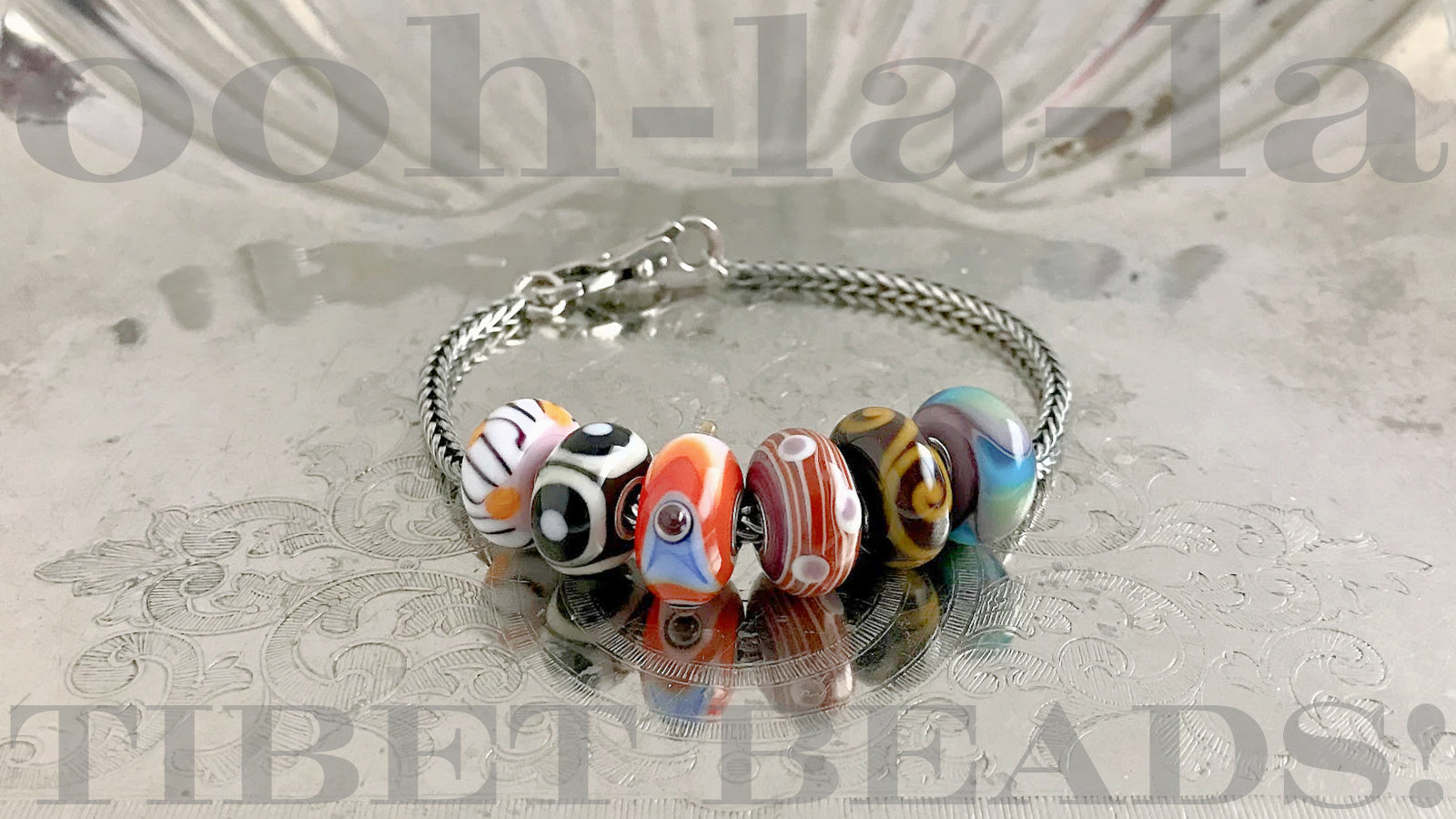 TWO complete sets of six “TIBET BEADS” Trollbeads will be available at Suzie Q Studio.