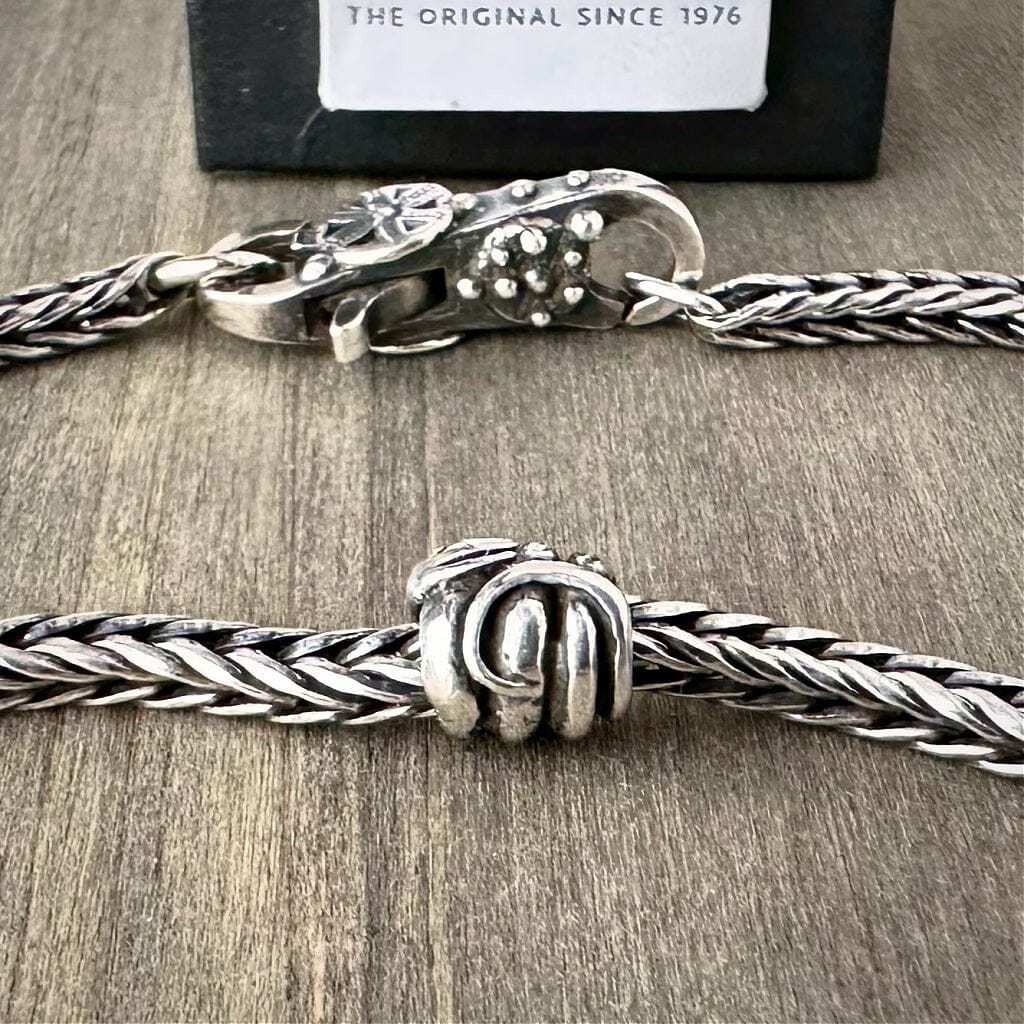 Suzie Q Studio's playful SNAKE Trollbead symbolizes wisdom, power, cunning and ingenuity. Check out Suzie Q Studio's entire collection of new, never worn Rare & Retired Trollbeads.