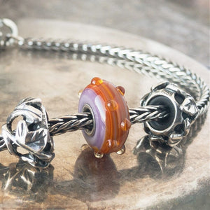 Suzie Q Studio has a treasure vault full of Rare & Retired Trollbeads... and we’re making them available to you. We’re starting with our Rare & Retired Glass Beads. We’ll be adding lots more so check back often. The plisè and colors of the ISSEY Trollbead are inspired by the Issey Miyake collection.