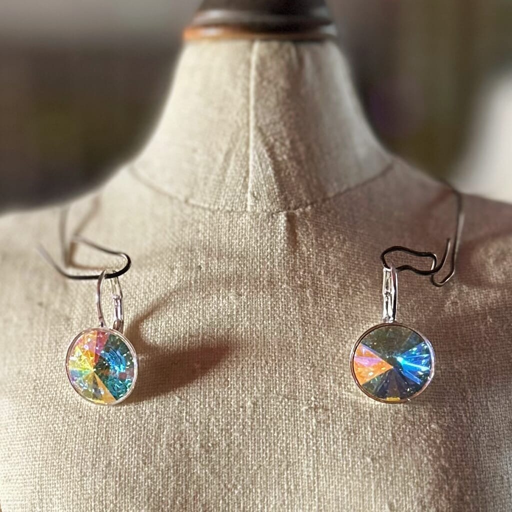 Swarovski crystal, "rivoli" stone style earrings, with AB/Aurora Borealis effect and secure, silver pated, lever-back ear wires.