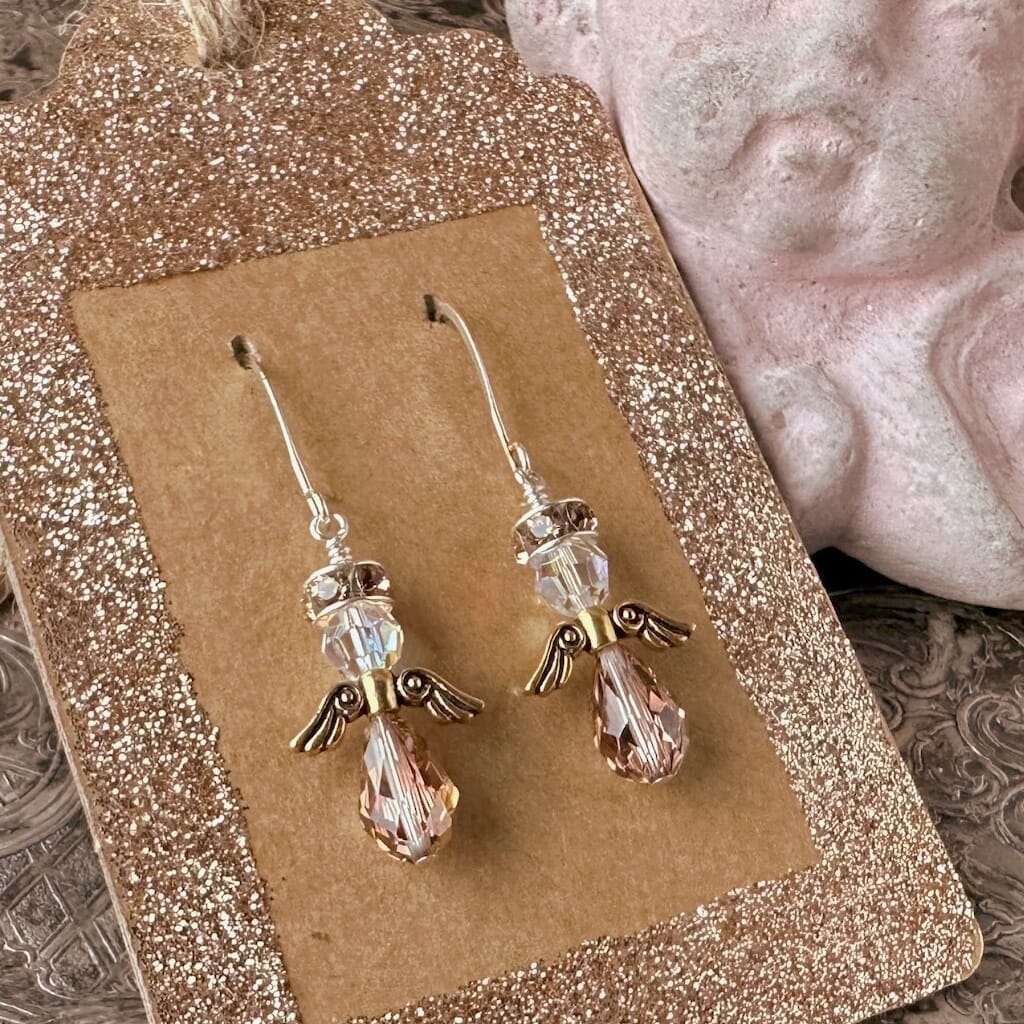 Swarovski crystal Christmas angel earrings at Suzie Q Studio, in various neutral colours, sparkly halo, gold wings and silver plate ear wires.