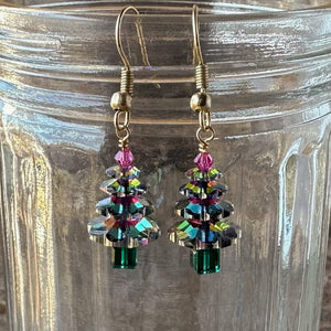 Sparkly Swarovski crystal Christmas tree earrings at Suzie Q Studio, variegated green, with fuchsia tree topper bead and gold-tone ear wires.