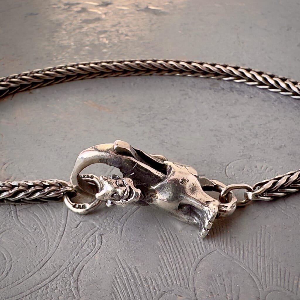 Trollbeads 30th Anniversary, sterling silver lock called, TROLL LOCK, originally released in 2006, shown on a sterling silver bracelet.