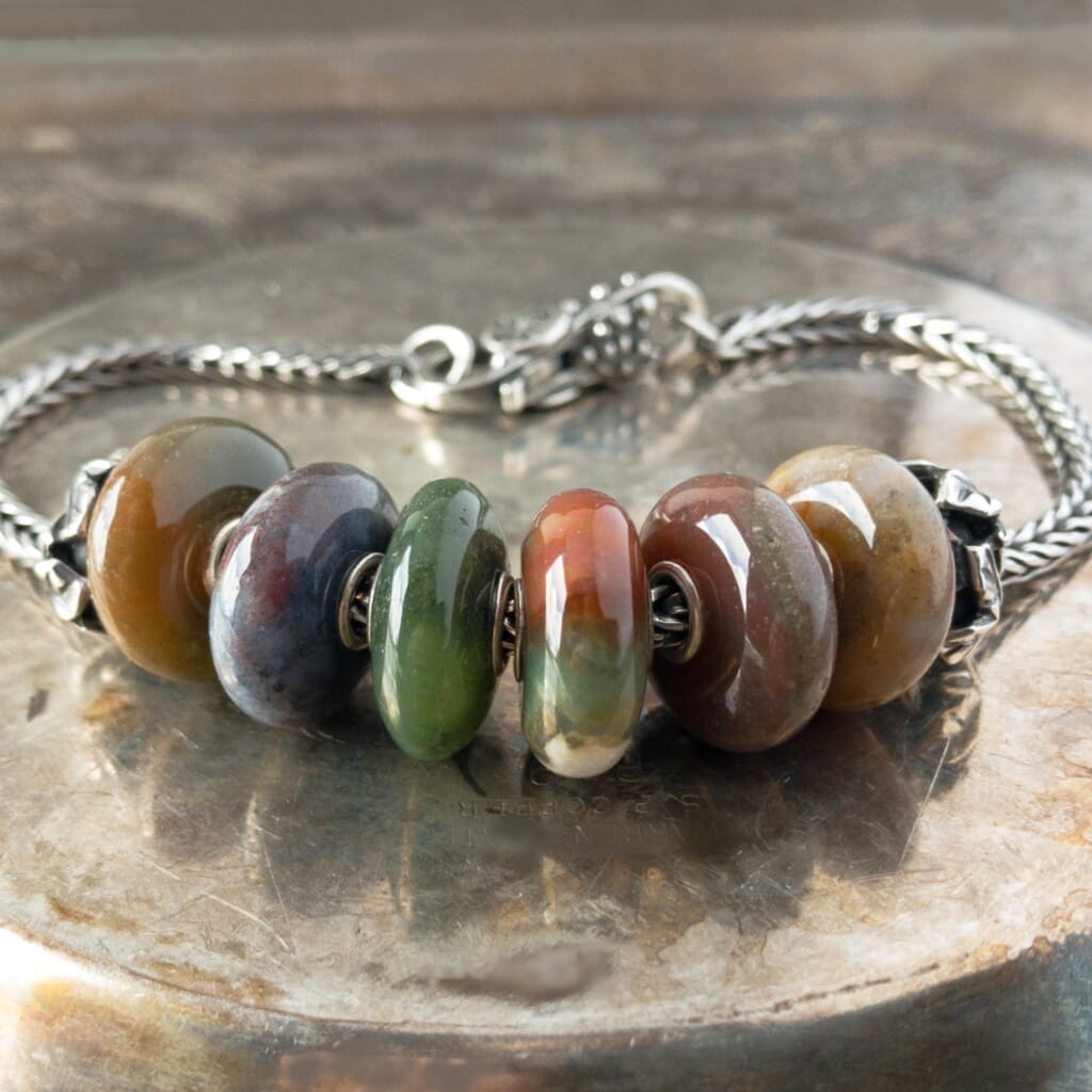 The Trollbeads FANTASY JASPER, SIX BEAD SET - ZEBRA JASPER was a Limited Edition release and Suzie Q Studio only has one set! The Jasper gemstone is believed to enhance ideas as well as creativity. Visit Suzie Q Studio for new stock, never worn, collectible Rare & Retired Trollbeads.