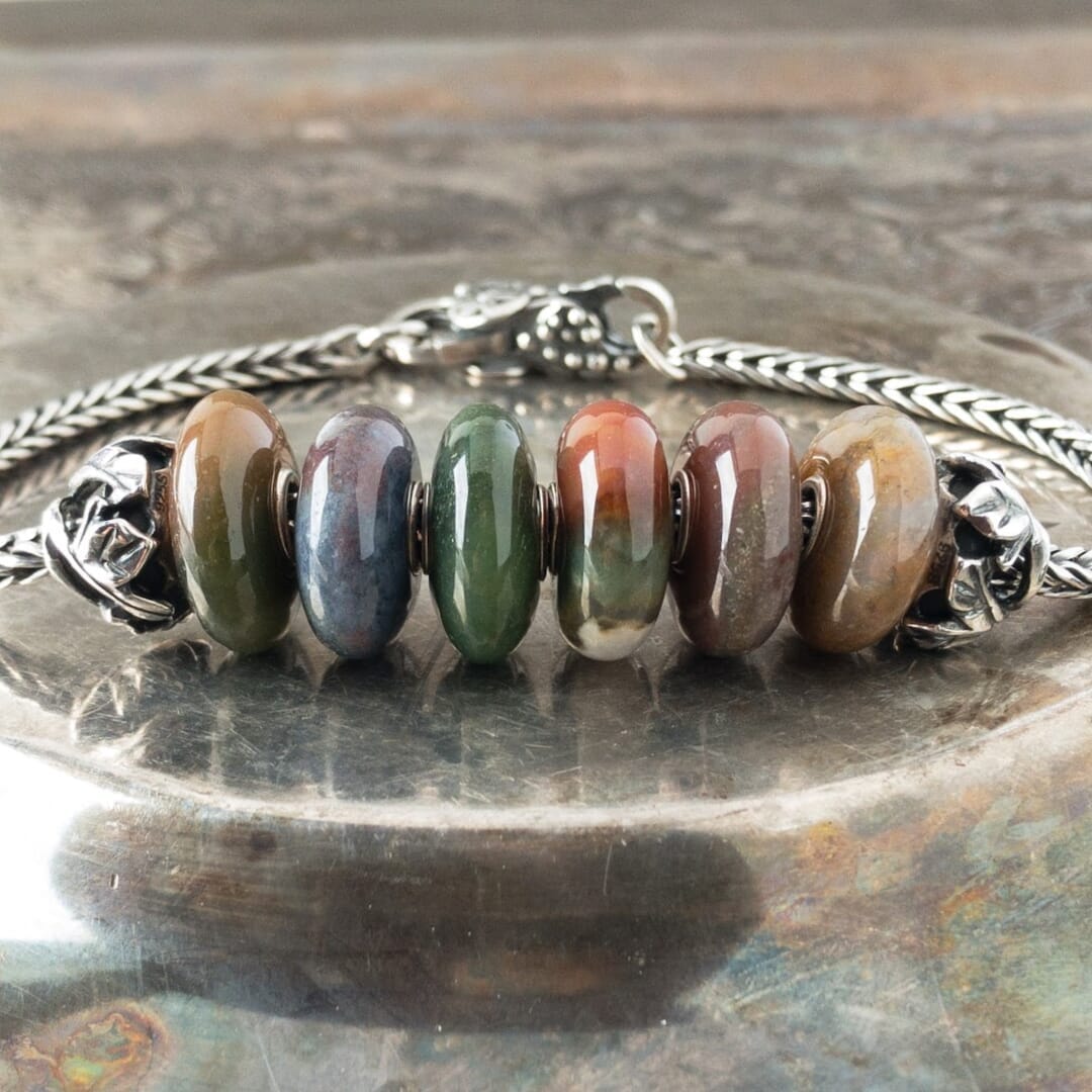 The Trollbeads FANTASY JASPER, SIX BEAD SET - ZEBRA JASPER was a Limited Edition release and Suzie Q Studio only has one set! The Jasper gemstone is believed to enhance ideas as well as creativity. Visit Suzie Q Studio for new stock, never worn, collectible Rare & Retired Trollbeads.