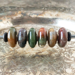 The Trollbeads FANTASY JASPER, SIX BEAD SET - ZEBRA JASPER was a Limited Edition release and Suzie Q Studio only has one set! The Jasper gemstone is believed to enhance ideas as well as creativity. Visit Suzie Q Studio for new stock, never worn, collectible Rare & Retired Trollbeads.