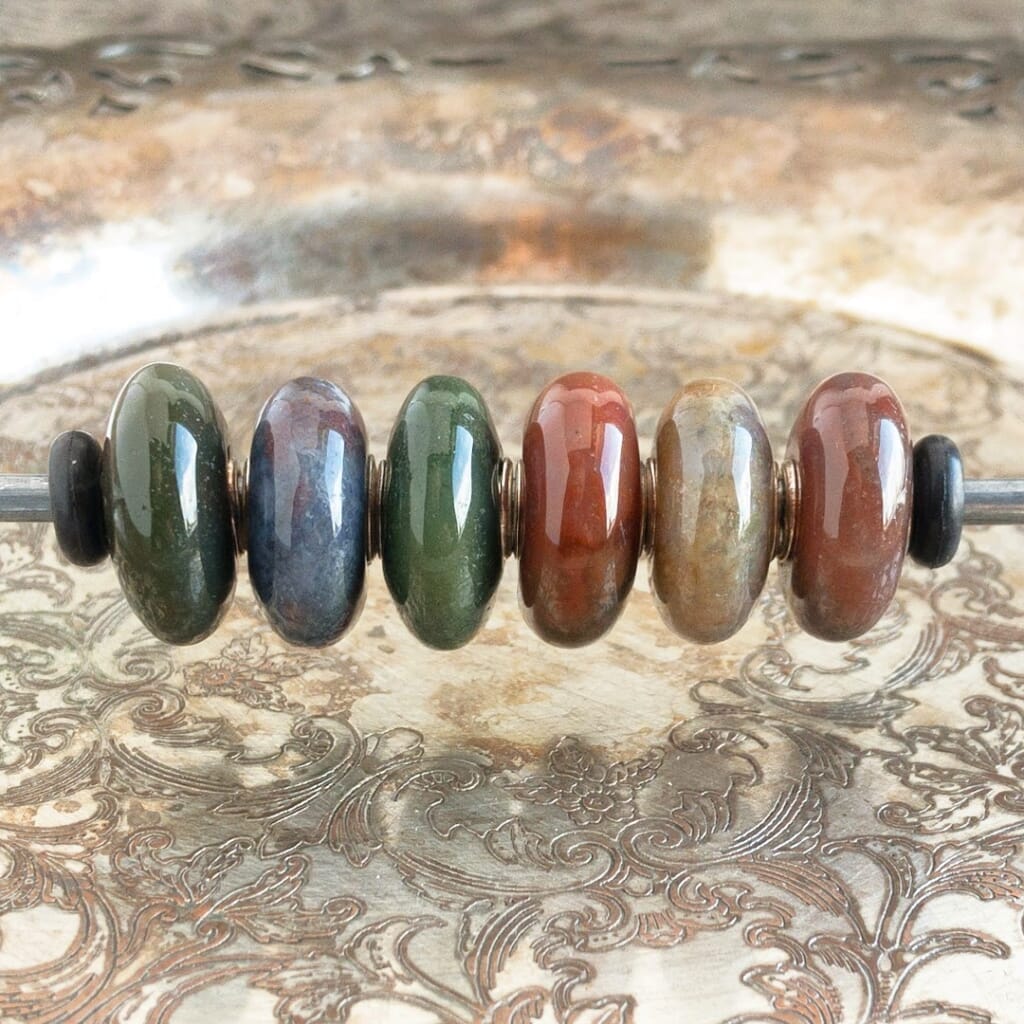 The Trollbeads FANTASY JASPER, SIX BEAD SET - ZEBRA JASPER was a Limited Edition release and Suzie Q Studio only has one set! The Jasper gemstone is believed to enhance ideas as well as creativity. Visit Suzie Q Studio for new stock, never worn, collectible Rare & Retired Trollbeads.