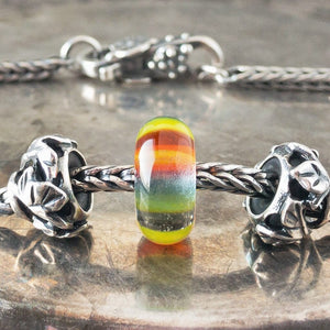 Suzie Q Studio has a treasure vault full of Rare and Retired Trollbeads... and we’re making them available to you. Luscious Trollbeads glass beads are handmade of Italian glass and each one is unique, such as this beautiful Green Rainbow Bead!