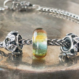 Suzie Q Studio has stashed away special glass, sterling silver and limited edition Trollbeads pieces in the Suzie Q “Troll Treasures Vault”. This Trollbeads Glass Bead Collection features some rare beauties, including this GREEN RAINBOW bead. We’re adding lots more to our Trollbeads Rare and Retired Collection so check back often!