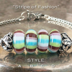 4 versions of Trollbeads STRIPE OF FASHION glass bead, with 4 colors of horizontal stripes, on a Trollbeads silver bracelet.