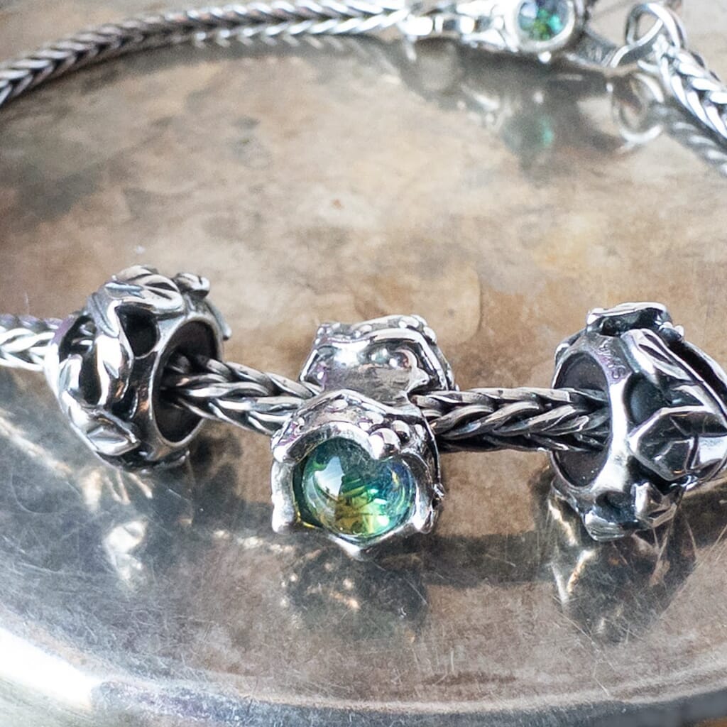  This Trollbeads Retired Limited Edition King & Queen Sterling Silver bead with dichroic glass is a rare beauty & available at Suzie Q Studio!