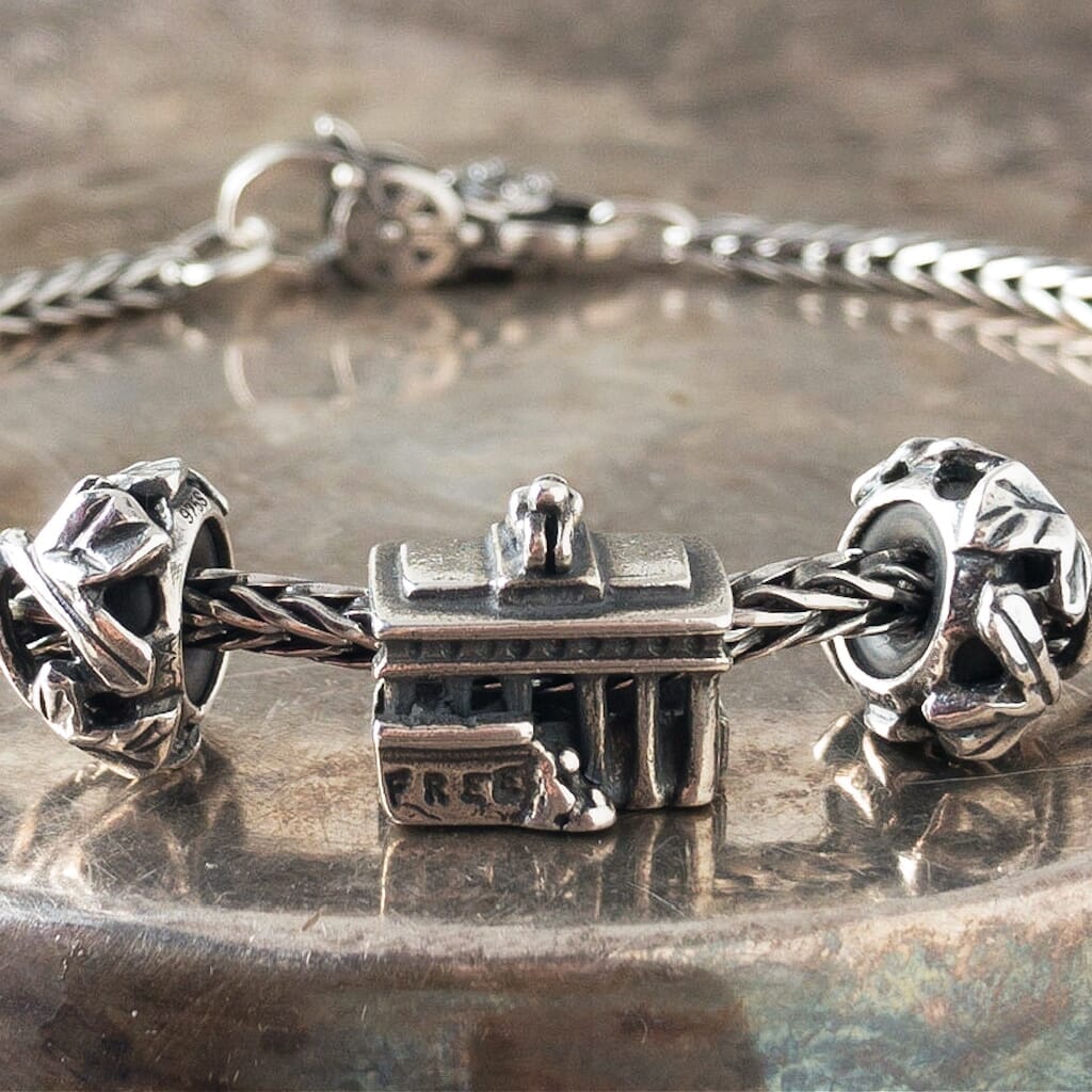 Trollbeads sterling silver bead depicting Germany’s Brandenburg Gate, shown on a Trollbeads sterling silver bracelet.