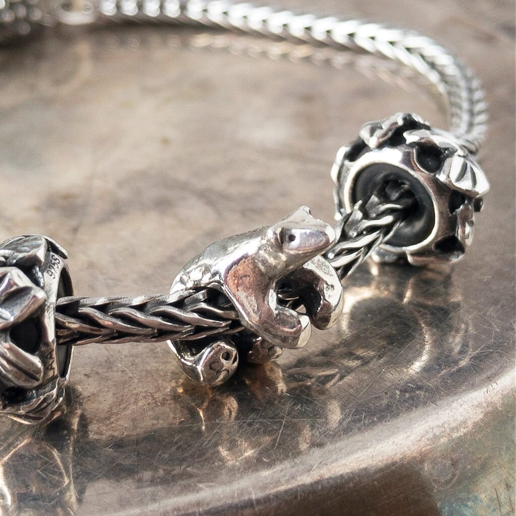 Trollbeads sterling silver ICE BEAR bead, depicting a polar bead, shown on a sterling silver Trollbeads bracelet.