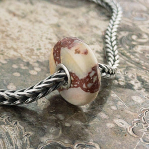 It’s summertime! Time to get out in nature for some sun and fresh air. It is from nature that we get this beautiful Summer gemstone. With its very own magic, nature designed the beautiful patterns and formations. Now it's ready to bring summer to your bracelet.  This was a Special Edition release. Special Editions are rare or unique beads which are only released in very small quantities, and which are only available in stores until sold out.