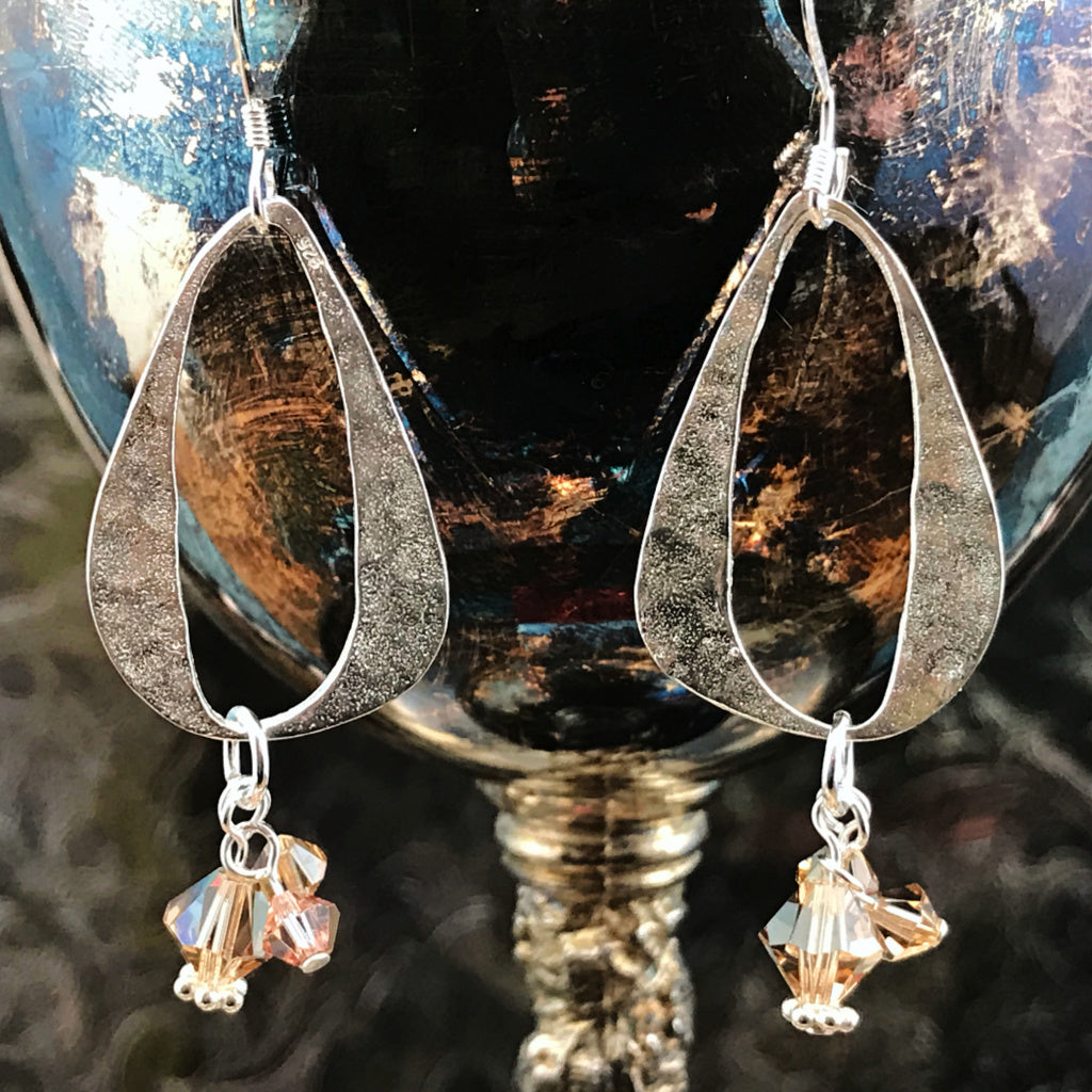 Suzie Q Studio’s I EAR YOU! Collection features unique earrings created by Suzie Q Studio artisans. The custom, sterling silver components used to create these one-of-a-kind, handmade earrings offer a definite 1960s, retro-vibe, and with a choice of some totally FAB Swarovski crystal color-combos.