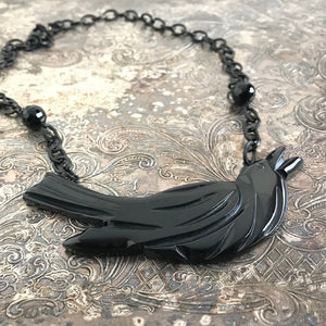 Suzie Q Studio carries HOTCAKES DESIGN retro-style, handmade jewelry taking its inspiration from classic Bakelite jewelry, vintage images and bold color.  This feel-good Blackbird necklace will suit any outfit from casual to funky-fancy!