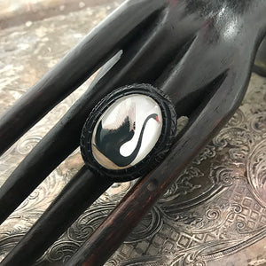 Suzie Q Studio carries HOTCAKES DESIGN retro-style, handmade jewelry taking its inspiration from classic Bakelite jewelry, vintage images and bold color. The graceful Black Swan image featured in this ring, is a gentle reminder to reclaim your personal power and wear it boldly!