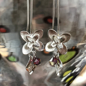 This Suzie Q Studio earring collection features handmade earrings created by Suzie Q Studio artisans. If you love a more delicate, modern-natural look, these precious, handcrafted sterling silver flower earrings, with a hint of Swarovski sparkle, are perfect for you and they're available in a variety of gorgeous colors.