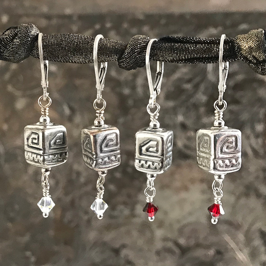 This Suzie Q Studio earring collection features handmade earrings created by Suzie Q Studio artisans. The geometric patterns on the electroformed (they’re hollow, so nice and light!) sterling silver beads featured in this pair of handmade earrings, have been used as sacred symbols, with the “spiral” representing positive energy and change. Choose your favourite colored crystal!