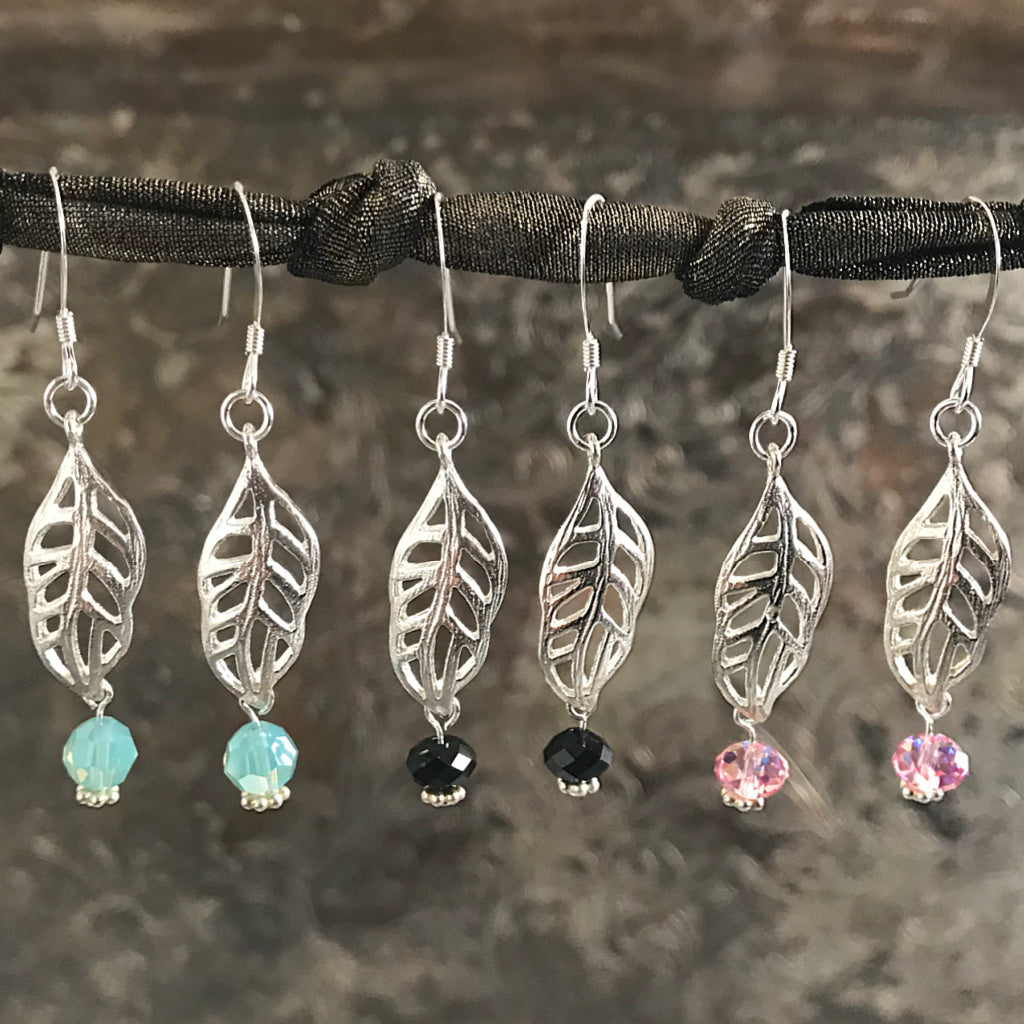 This Suzie Q Studio earring collection features handmade earrings created by Suzie Q Studio artisans. Light and airy, these sterling silver, handcrafted, one-of-a-kind “lacy leaf” style earrings are a delight to wear and available in a variety of colors, but only ONE pair of each design, so don’t miss out on the pair that suits your own inimitable style!