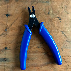 When it comes to making jewelry, if you want fabulous results, using Suzie Q Studio's jewelry-making tools is the way to go! The Crimping Plier is used to “double fold” a crimp tube that securely attaches a clasp onto a bead strung necklace or bracelet giving it a polished and professional appearance.