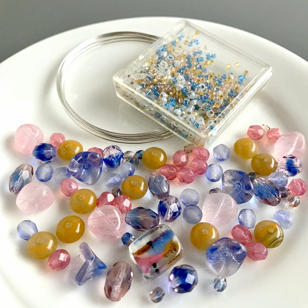 Suzie Q Studio's Serendipity BEAD STEW DIY EASY BANGLE STYLE BRACELET MAKING KITS are limited edition collections of artfully curated premium quality beads and components for you to make a one-of-a-kind bracelet that’ll have that super-cool look of multiple bangles stacked on your wrist. No experience needed!
