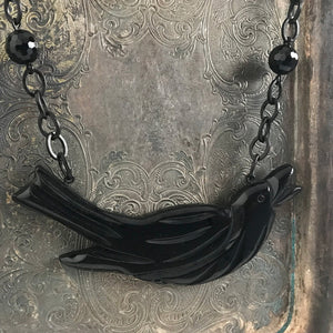 Suzie Q Studio carries HOTCAKES DESIGN retro-style, handmade jewelry taking its inspiration from classic Bakelite jewelry, vintage images and bold color.  This feel-good Blackbird necklace will suit any outfit from casual to funky-fancy!