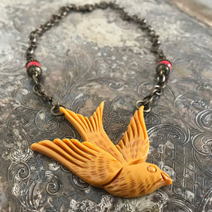 Suzie Q Studio carries HOTCAKES DESIGN retro-style, handmade jewelry taking its inspiration from classic Bakelite jewelry, vintage images and bold color. You'll feel happy-go-lucky with this faux-bakelite “Swallow” around your neck!