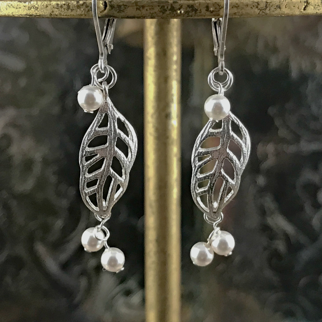 This Suzie Q Studio earring collection features handmade earrings created by Suzie Q Studio artisans. Light and airy, these sterling silver, handcrafted, one-of-a-kind “lacy leaf” style earrings are a delight to wear and available in a variety of colors, but only ONE pair of each design, so don’t miss out on the pair that suits your own inimitable style!