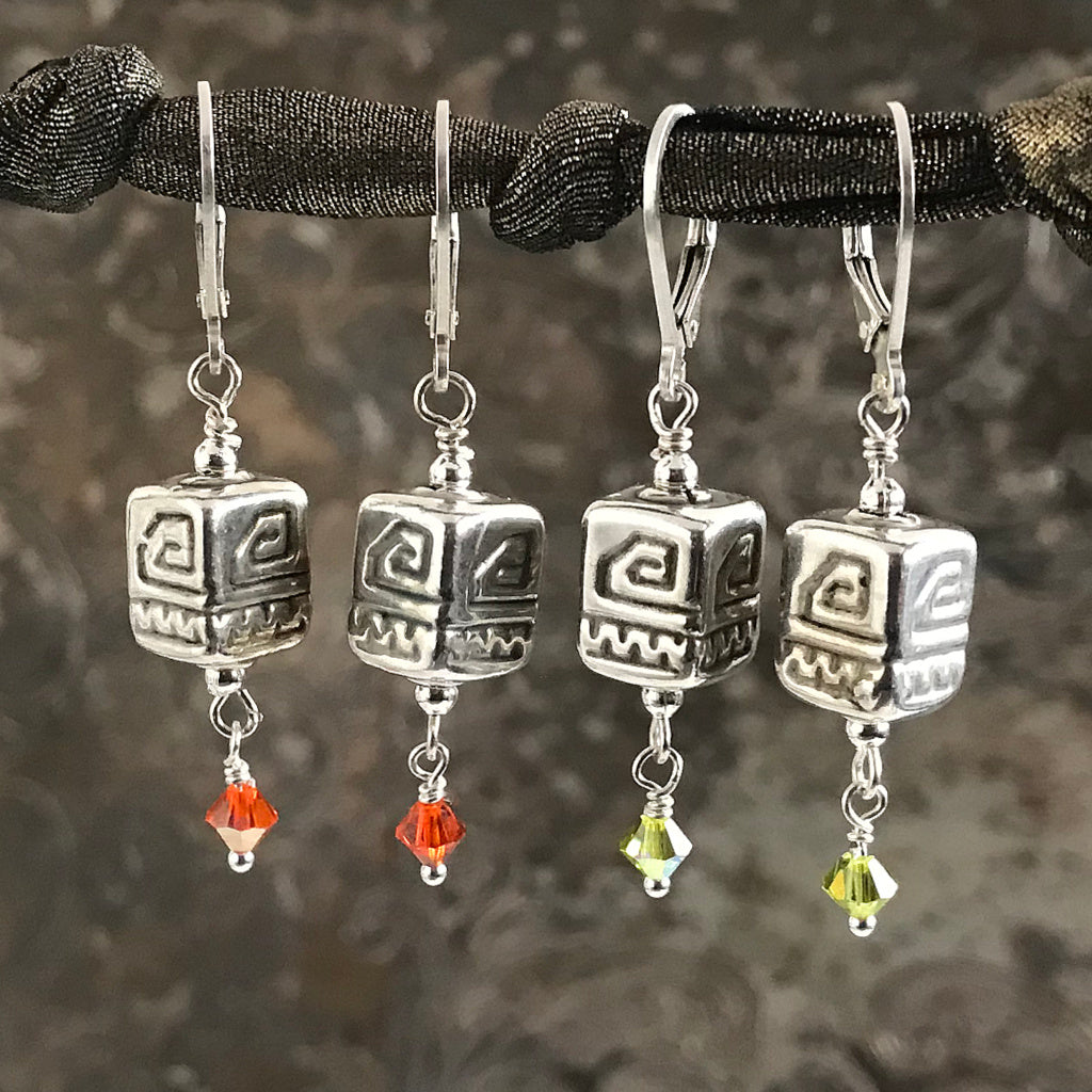 This Suzie Q Studio earring collection features handmade earrings created by Suzie Q Studio artisans. The geometric patterns on the electroformed (they’re hollow, so nice and light!) sterling silver beads featured in this pair of handmade earrings, have been used as sacred symbols, with the “spiral” representing positive energy and change. Choose your favourite colored crystal!