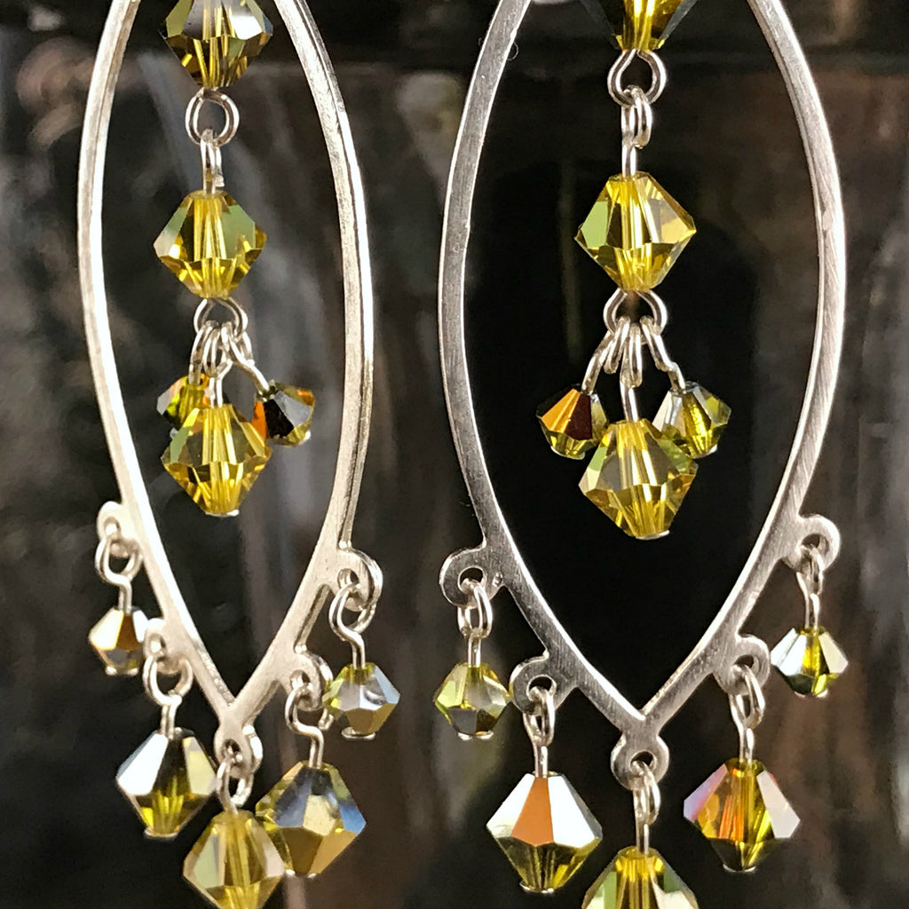 Suzie Q Studio’s I EAR YOU! Earring Collection features unique earrings which were created as jewelry-making class samples.These one-of-a-kind, handmade, statement-making chandelier earrings will totally “jazz-up” your next zoom call.