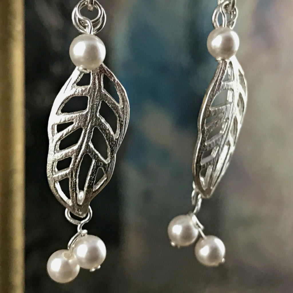 This Suzie Q Studio earring collection features handmade earrings created by Suzie Q Studio artisans. Light and airy, these sterling silver, handcrafted, one-of-a-kind “lacy leaf” style earrings are a delight to wear and available in a variety of colors, but only ONE pair of each design, so don’t miss out on the pair that suits your own inimitable style!