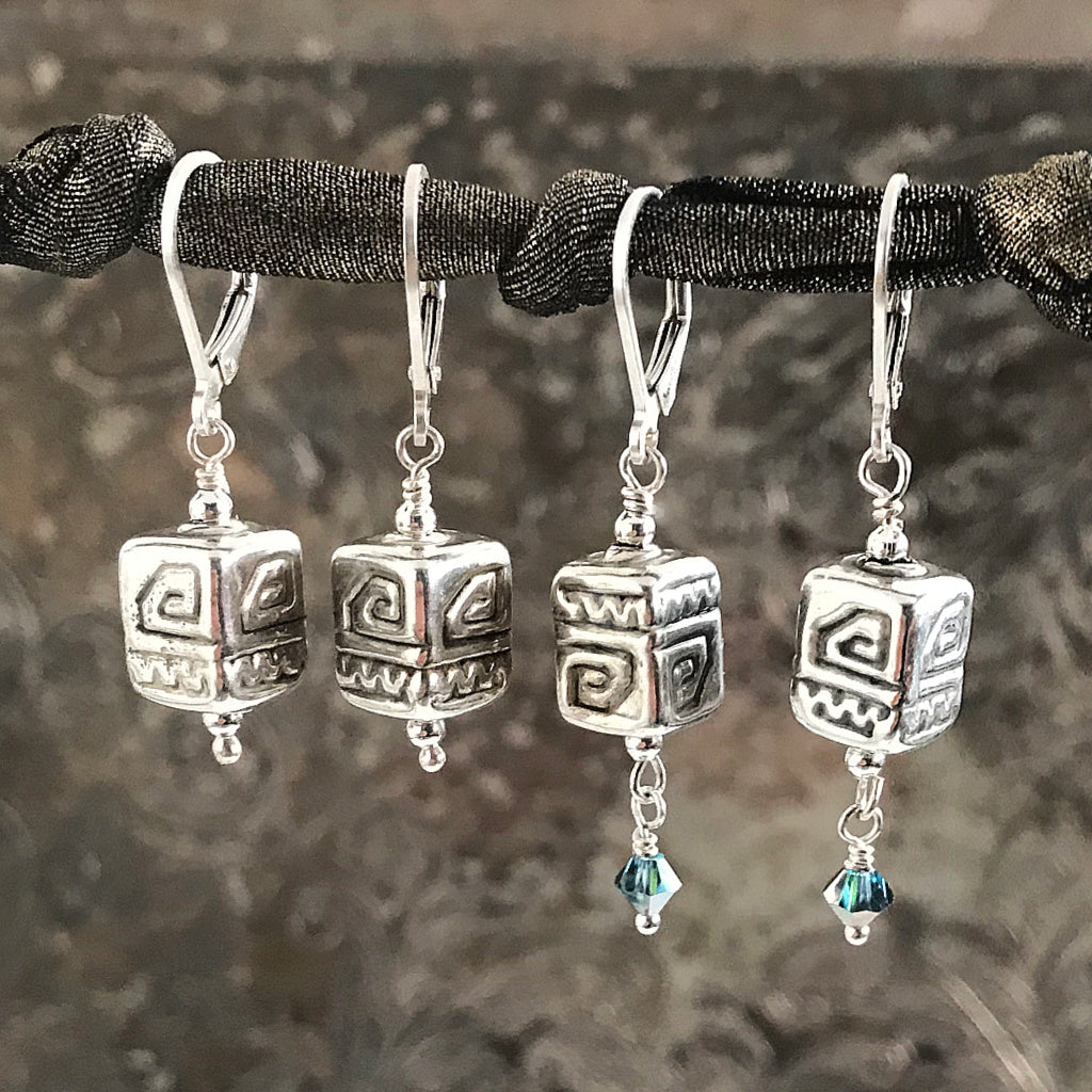 This Suzie Q Studio earring collection features handmade earrings created by Suzie Q Studio artisans. The geometric patterns on the electroformed (they’re hollow, so nice and light!) sterling silver beads featured in this pair of handmade earrings, have been used as sacred symbols, with the “spiral” representing positive energy and change. Choose your favourite colored crystal!