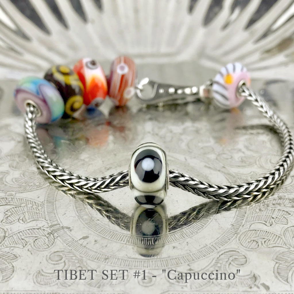 Now available at Suzie Q Studio, the ultra-rare Trollbeads Tibet Beads. This shows the Capuccino Tibet Bead in Set 1.