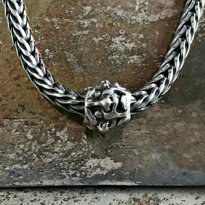Suzie Q Studio has a treasure vault full of Rare and Retired Trollbeads... and we’re making them available to you. This is a super-rare and super-cool Trollbead! Amazingly, Trollbeads artisan, Søren Nielsen, found room for five different faces, each in its own mood!