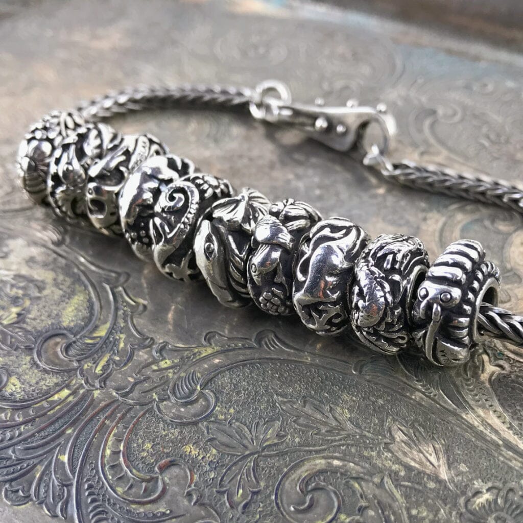 Now available at Suzie Q Studio, the complete set of 10  Trollbeads China Limited Edition Sterling Silver Beads. All NEW stock and never worn.