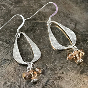 Suzie Q Studio’s I EAR YOU! Collection features unique earrings created by Suzie Q Studio artisans. The custom, sterling silver components used to create these one-of-a-kind, handmade earrings offer a definite 1960s, retro-vibe, and with a choice of some totally FAB Swarovski crystal color-combos.