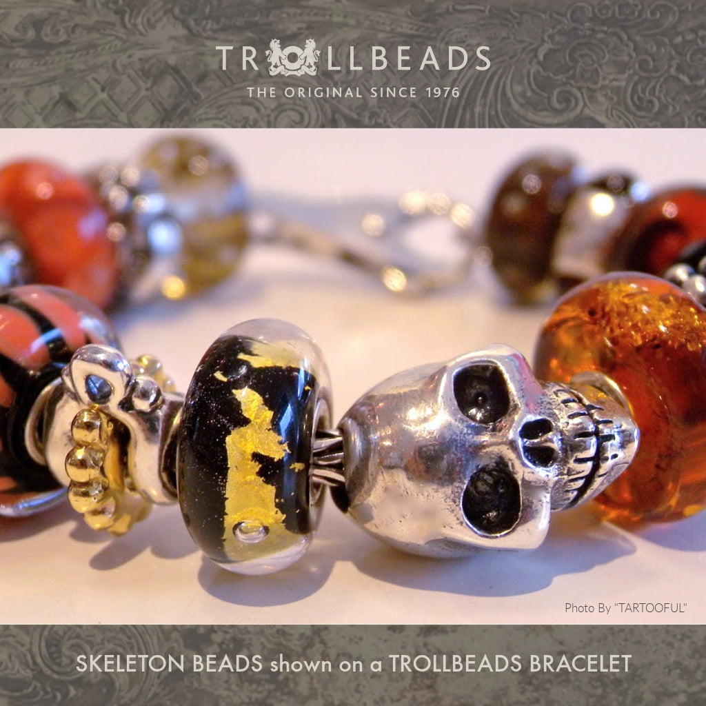 The detailing of Suzie Q Studio’s Trollbeads Skeleton Necklace is exquisite! It is made up of nine separate sterling silver pieces and a “sun circle” bead of solid 18KT gold. Some of these pieces can be removed and added to a Trollbeads bracelet.