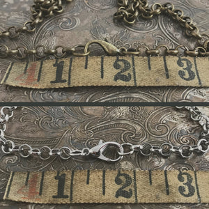 Need a chain for your MY MOTHERS BUTTONS “Horse Bridle Rosette Pendant”? Suzie Q Studio's ready-to-wear, antique bronze-coloured, “rolo-style” chain will complement it perfectly, or any other chunkier pendant in your collection. They're very easy to shorten too!