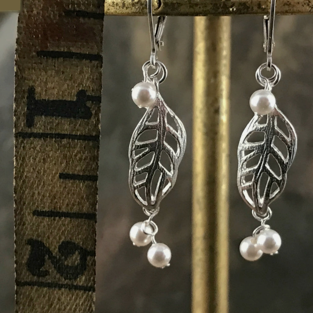 This Suzie Q Studio earring collection features handmade earrings created by Suzie Q Studio artisans. Light and airy, these sterling silver, handcrafted, one-of-a-kind “lacy leaf” style earrings are a delight to wear and available in a variety of colors, but only ONE pair of each design, so don’t miss out on the pair that suits your own inimitable style!