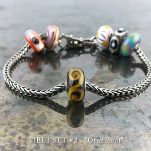 Now available at Suzie Q Studio, the ultra-rare Trollbeads Tibet Beads. This is the ORNAMENT bead in the Trollbeads Tibet Set #2.