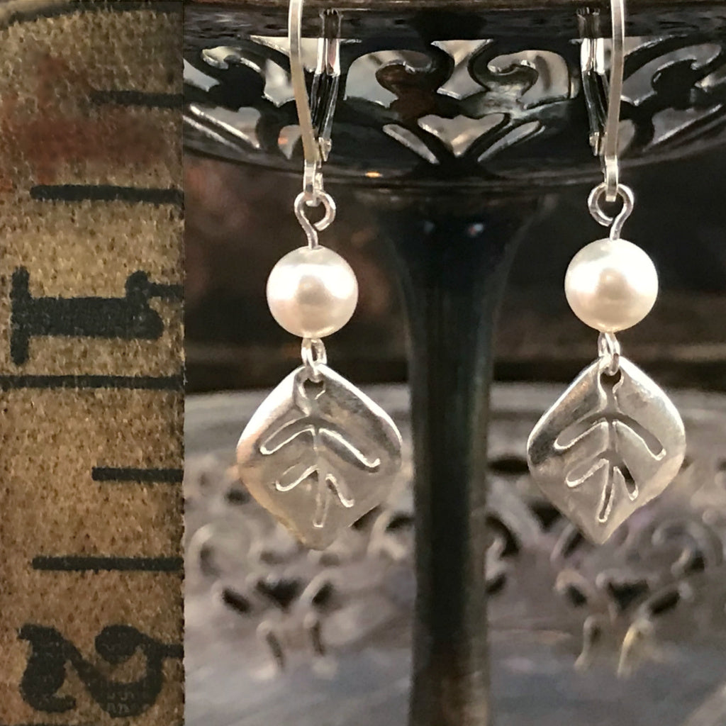 This Suzie Q Studio earring collection features handmade earrings created by Suzie Q Studio artisans. Do you love nature? Wearing “A New Leaf On Life” sterling silver, one-of-a-kind, handmade earrings is a wonderful way to express your own unique energy and style.